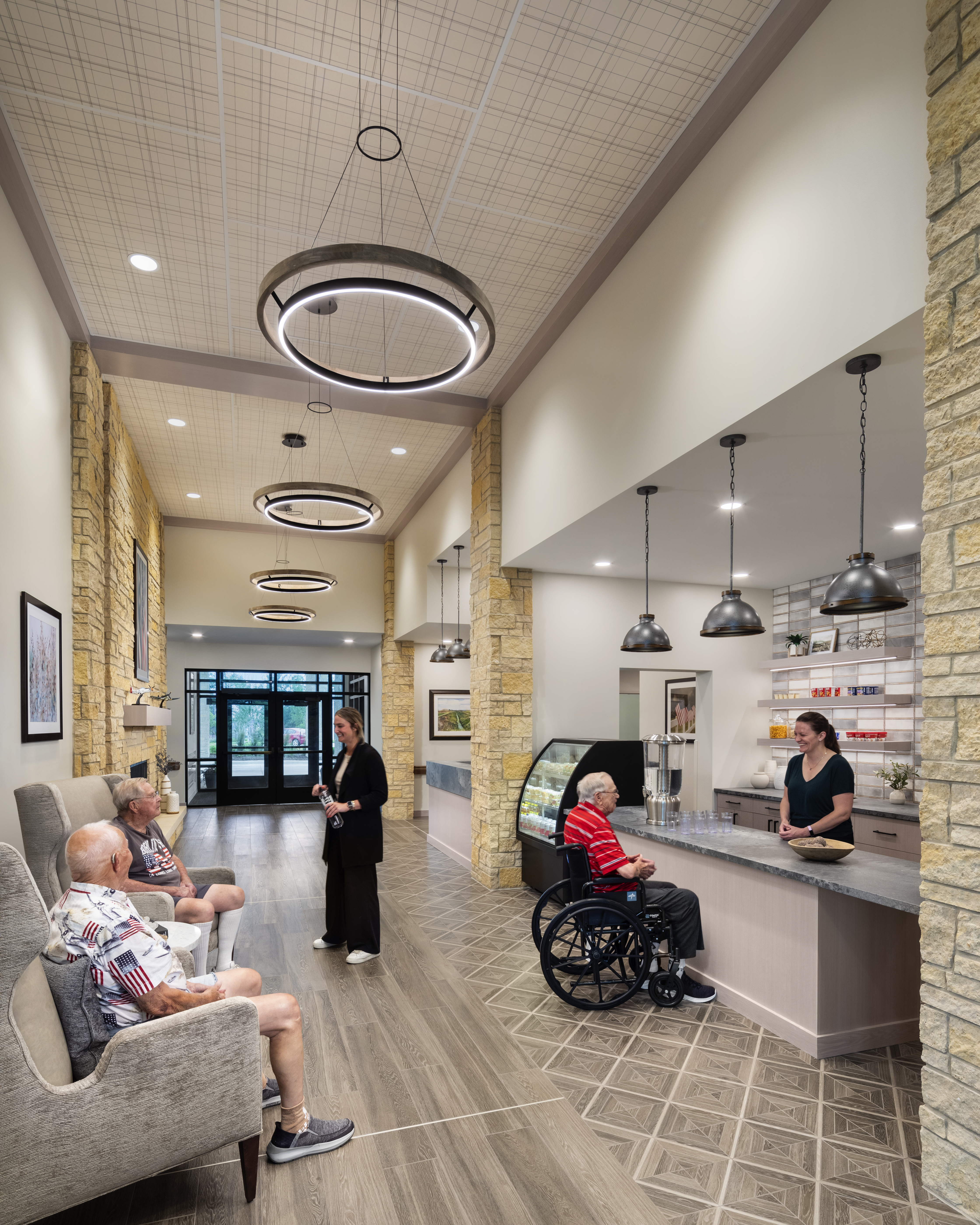 MDVA Preston Photo Int Lobby w People Photograph by Andrew Rugge Copyright Perkins Eastman